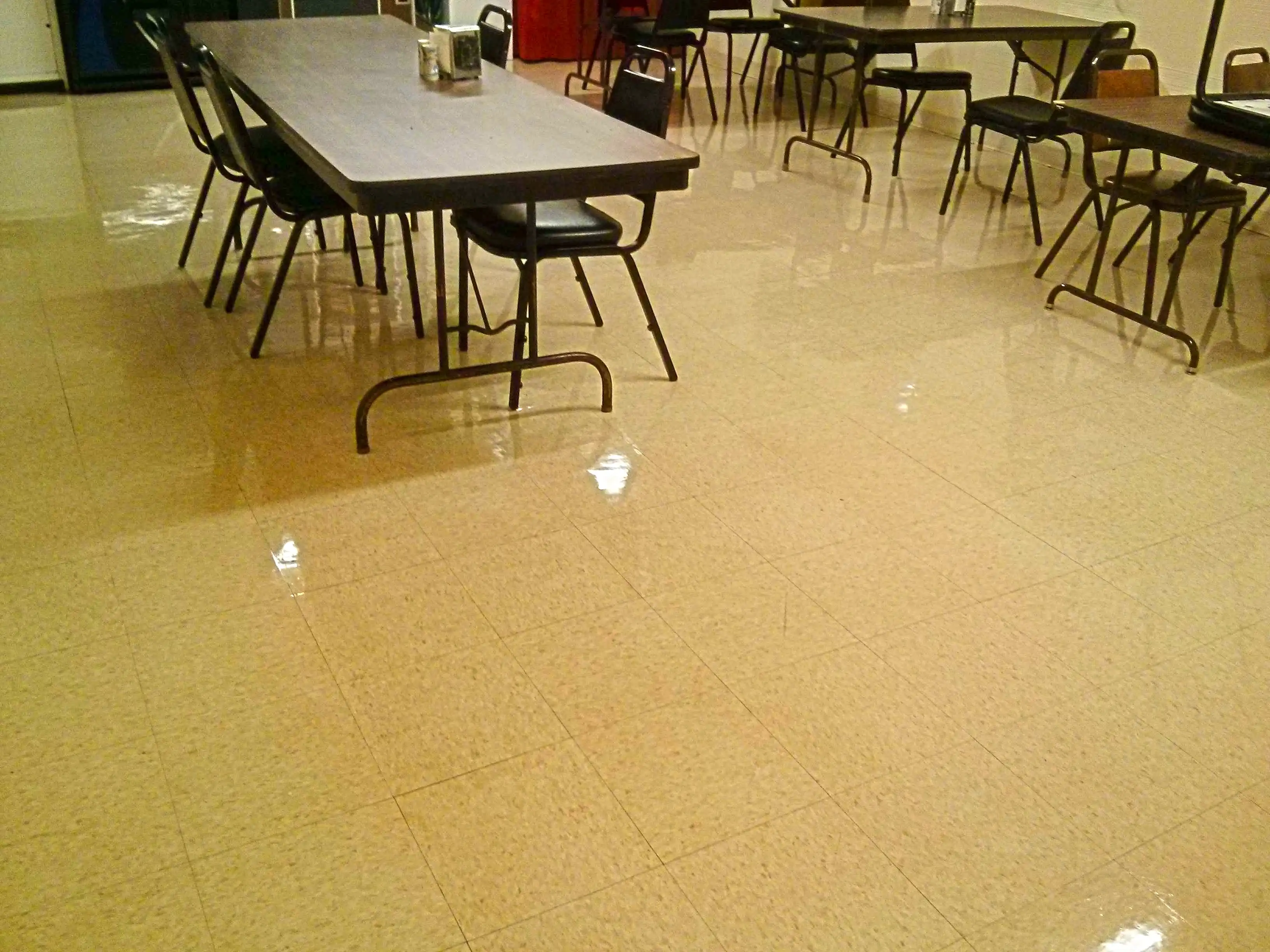 very-old-vct-tile-floor-stripped-sealed-and-clear-coat-finished-in-minneapolis