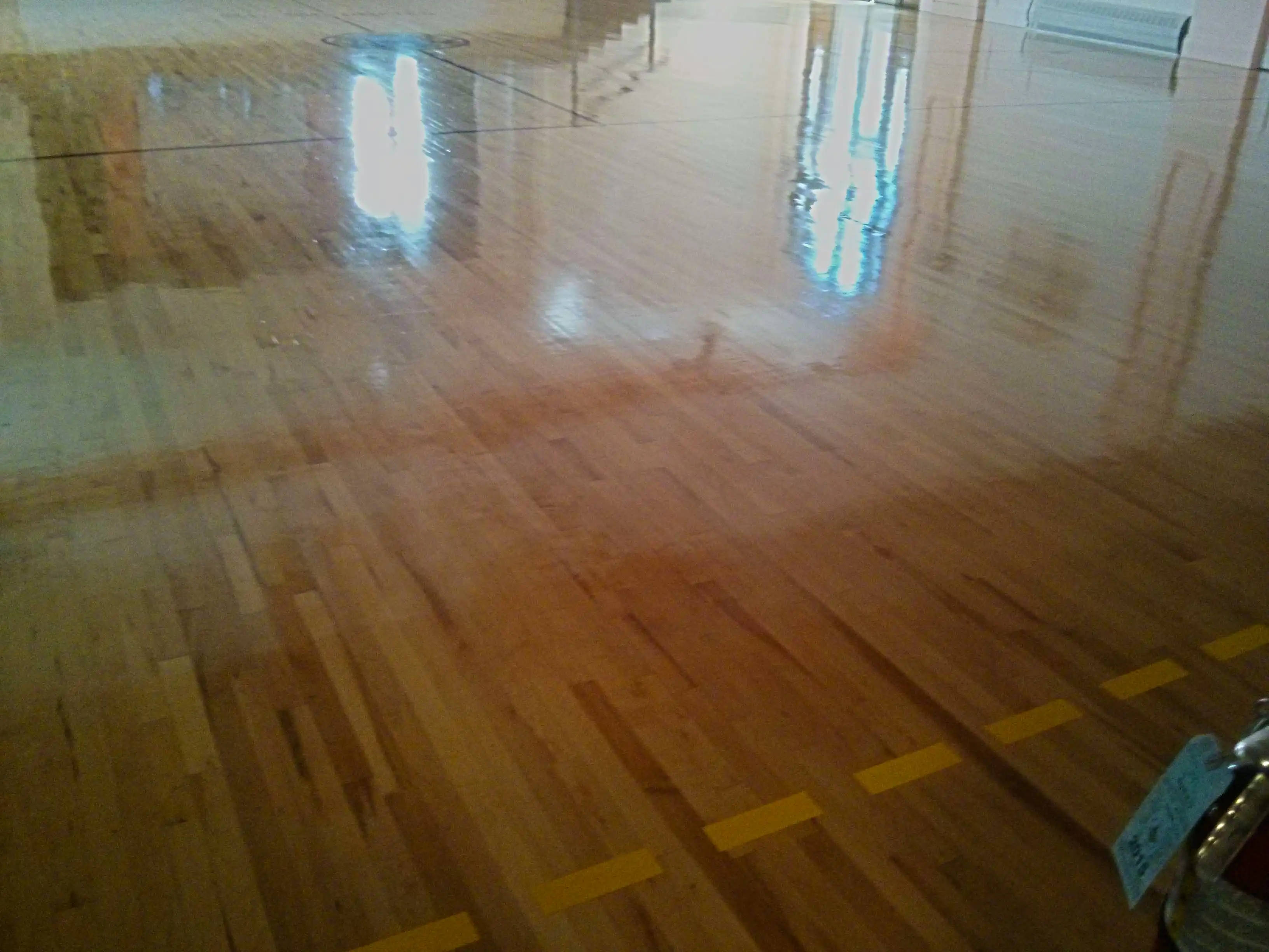 wood-gym-floor-scrub-and-clear-high-gloss-gym-coating-services-in-minneapolis-mn