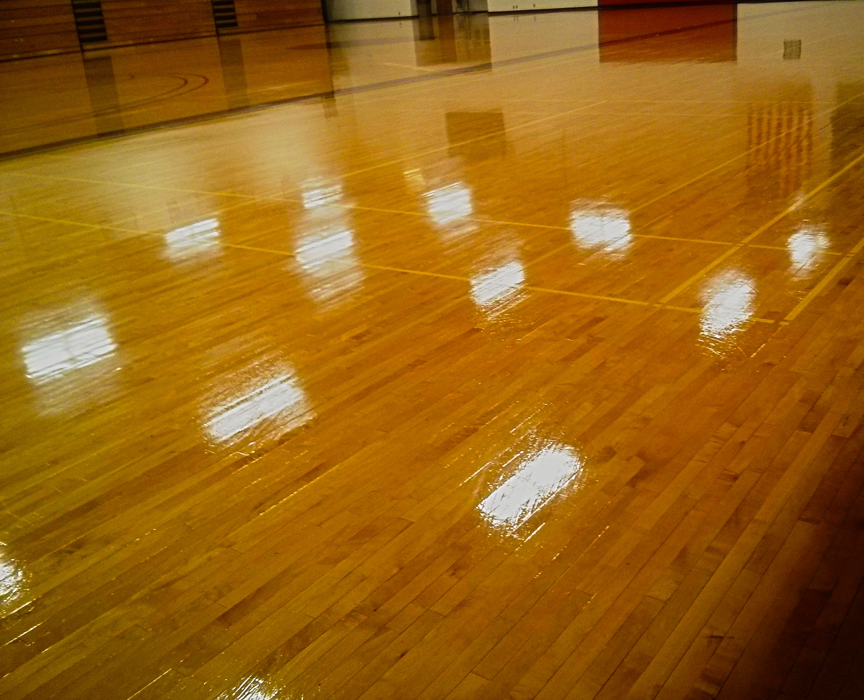 Minneapolis College Wood Gym Floor Recoating image 1